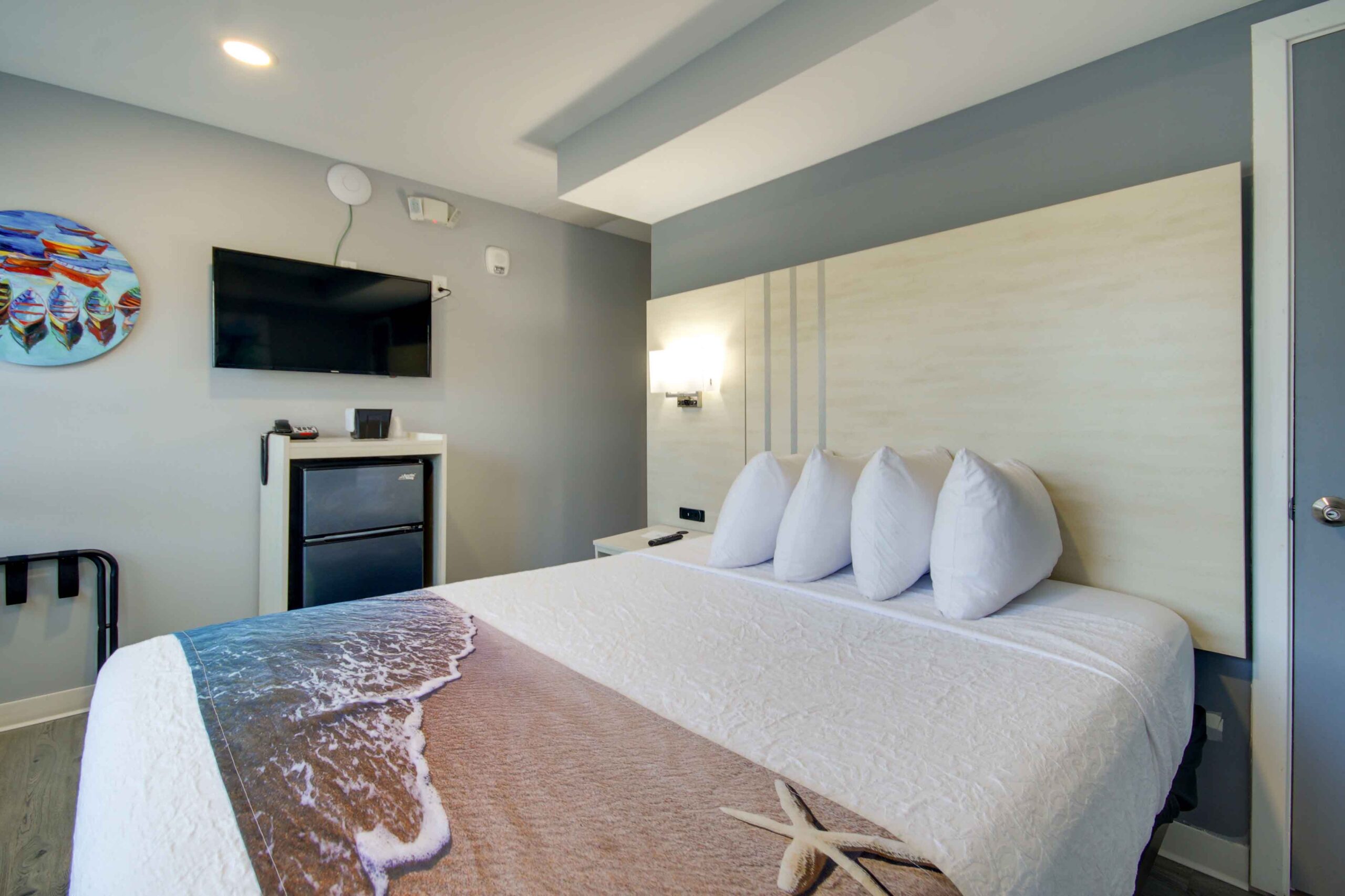 hotel room with queen bed
