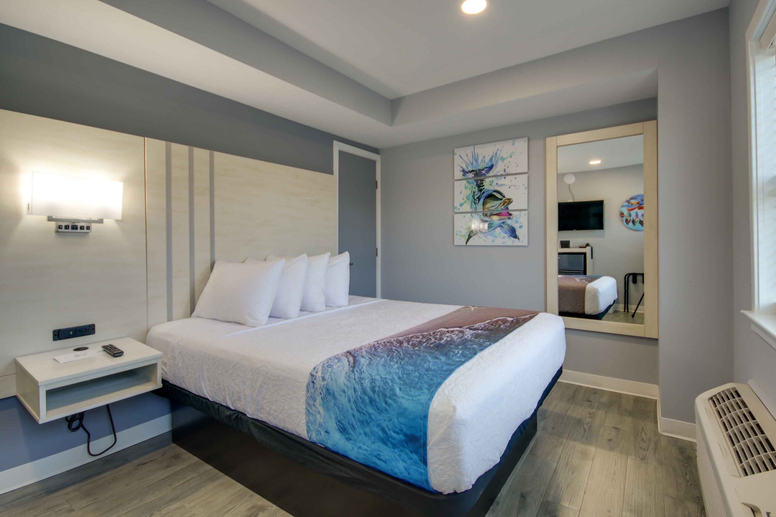hotel room with queen bed