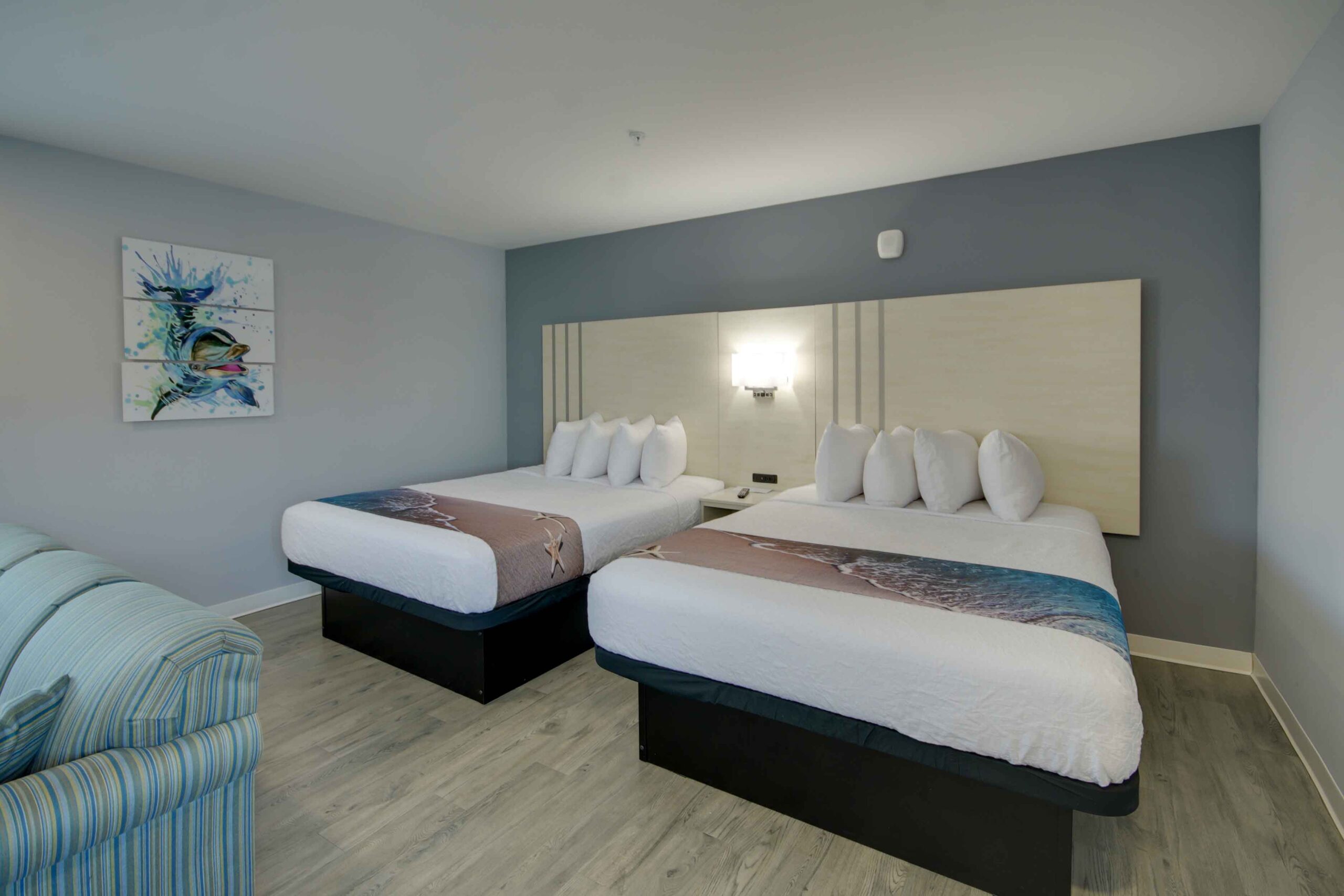 hotel room with two queen beds